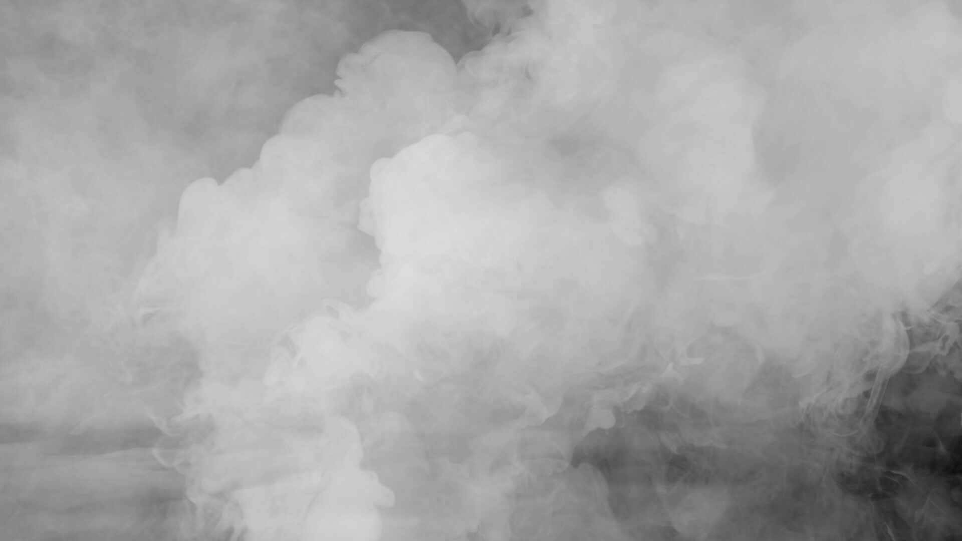 Abstract smoke steam moves on a black background